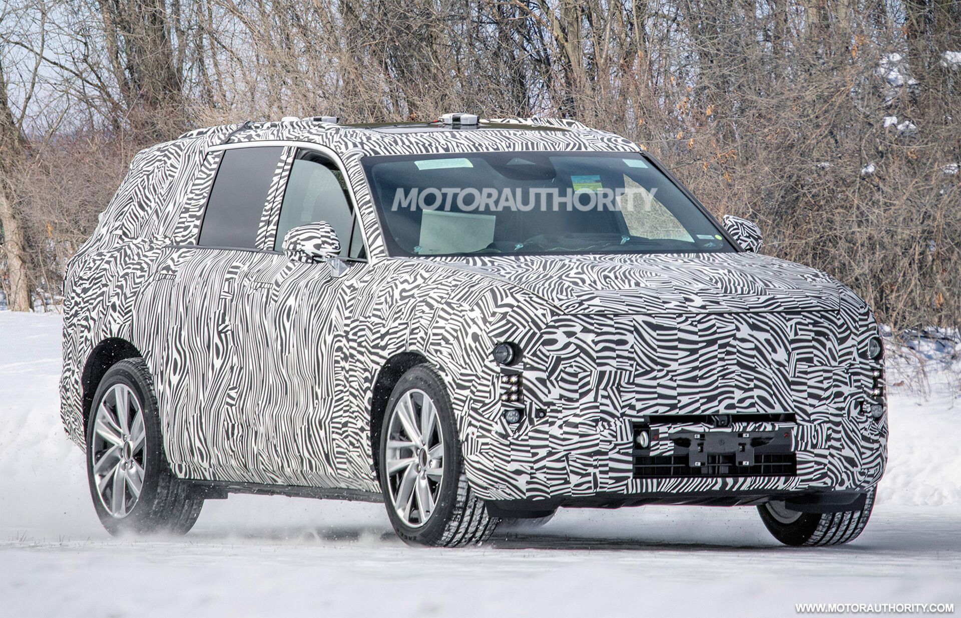 Cadillac’s New Electric SUV to Replace Gas-Powered XT6 2024-cadillac-3-row-electric-suv-spy-shots